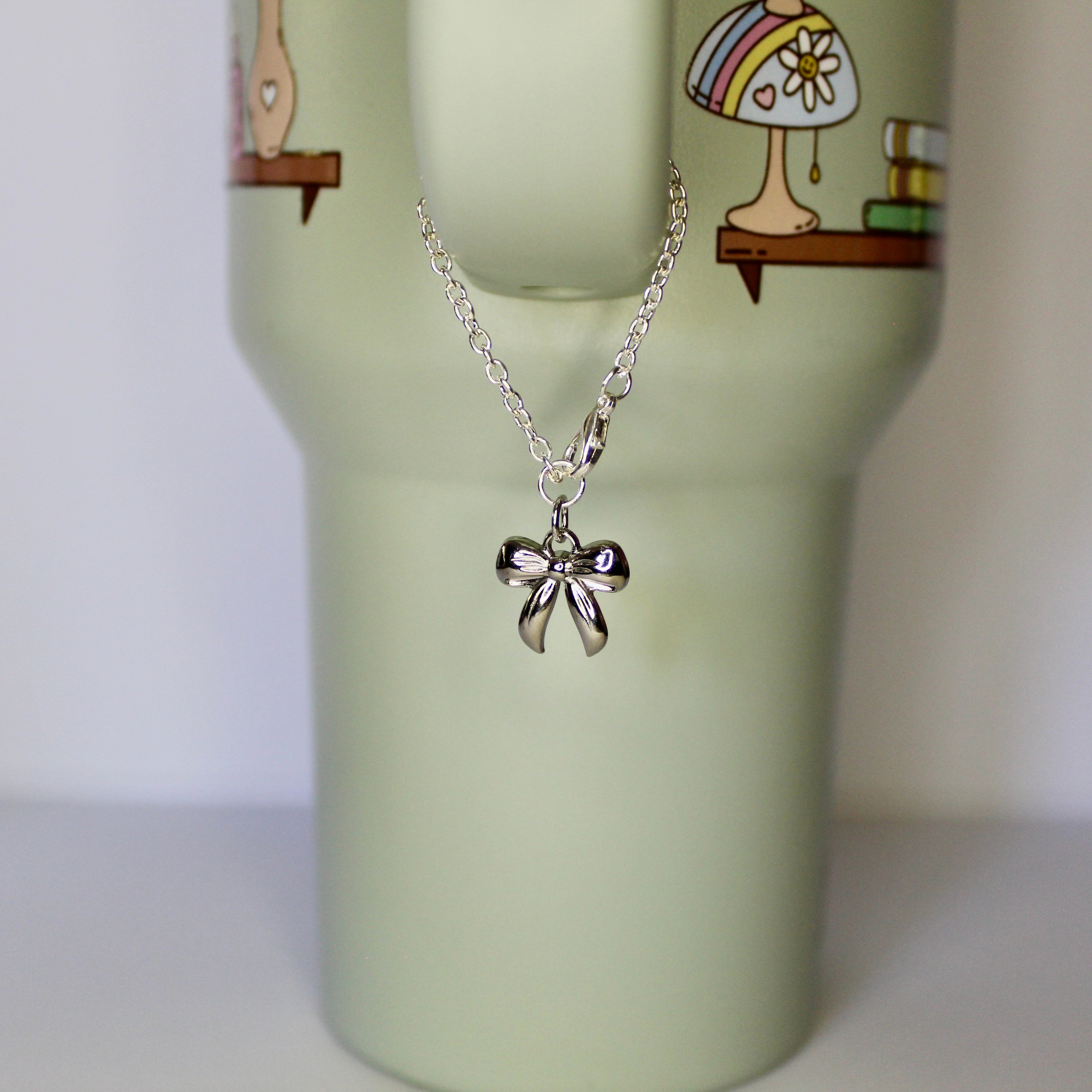 The Bow Tumbler Charm