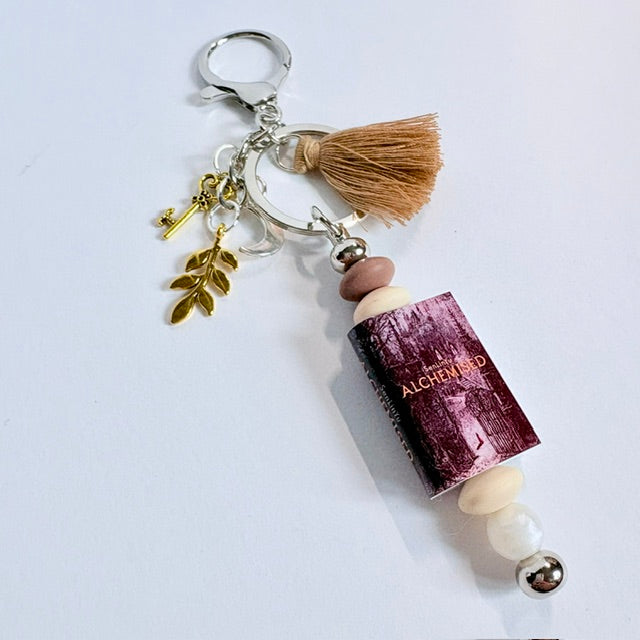 The Alchemist's Whisper Book Charm Keychain