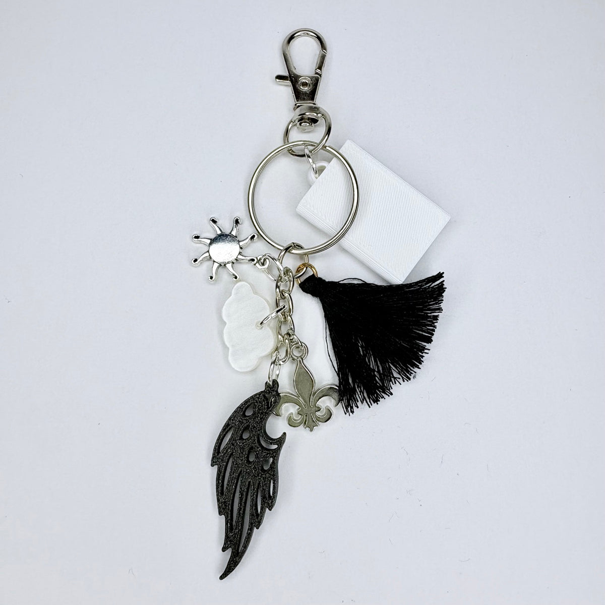 Sun, Shadow & Secrets Keychain