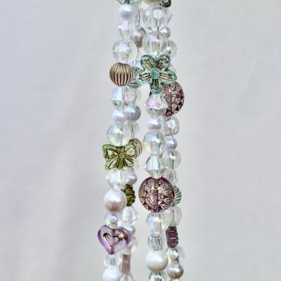 Full view of the handmade Antique Garden beaded plant hanger, showcasing its vintage-inspired design.