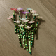 An array of custom beaded flower magnets, showcasing various vibrant color combinations available.