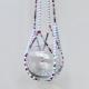 The complete Berry Frost beaded plant hanger, a colorful home decor accent with vibrant jewel tones.