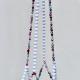 Macro detail of the raspberry, plum, and teal crystal beads contrasting with frosted white beads.