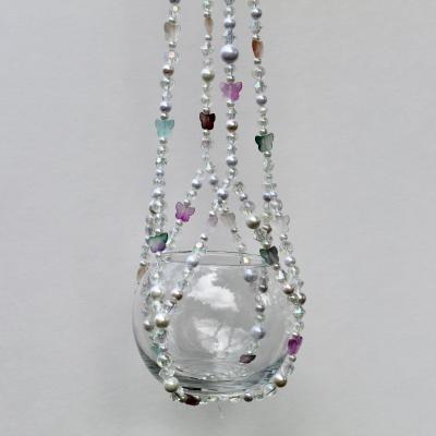 The complete Butterfly Garden beaded plant hanger, a whimsical fairycore decor piece with pastel accents.
