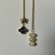 Full view of the Moon Bow and Clover Charm.