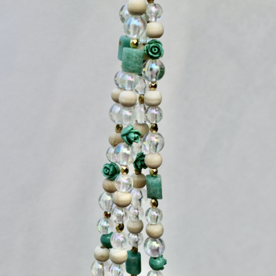 The complete Sage & Sand beaded plant hanger, showcasing its earthy, neutral, and organic elegance.