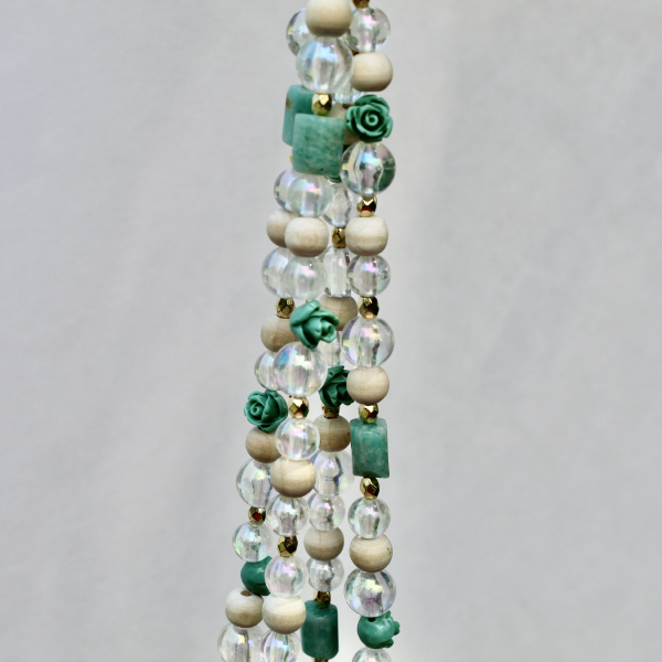 The complete Sage & Sand beaded plant hanger, showcasing its earthy, neutral, and organic elegance.