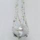 The complete Sugar Cloud beaded plant hanger, a whimsical piece with a dreamy pastel color palette.